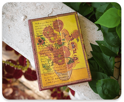 Van Gogh's document folder Sunflower journal on the edge of a stone table.
